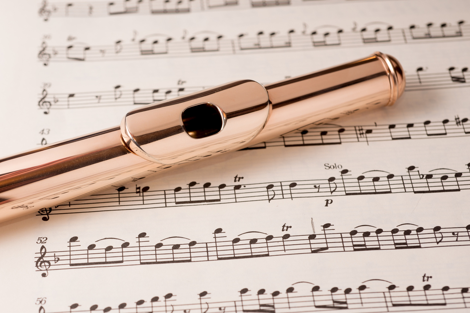 Golden flute head